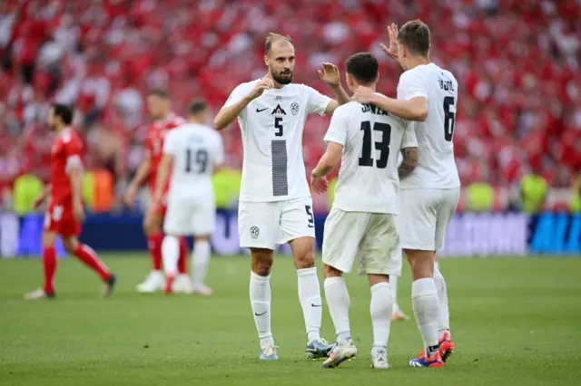 Slovenia celebrating post-match