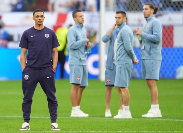 Trent Alexander-Arnold looks on