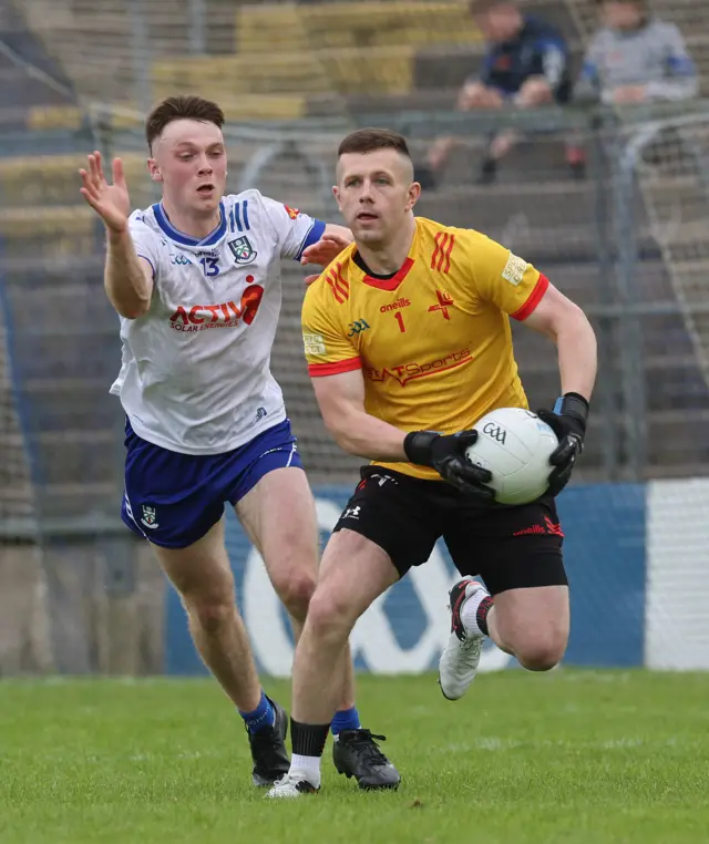 Monaghan’s Ciaran McNulty challenges Louth keeper Niall McDonnell at Clones