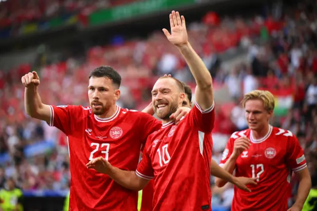 Christian Eriksen celebrates with Pierre-Emile Hojbjerg