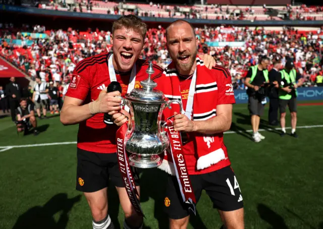 Rasmus Hojlund and Christian Eriksen with the FA Cup trophy