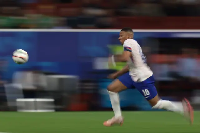 Kylian Mbappe sprinting