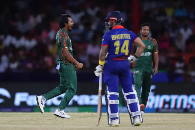 Tanzim Hasan Sakib of Bangladesh celebrates after bowling Kushal Bhurtel of Nepal during the ICC Men's T20 Cricket World Cup West Indies & USA 2024 match