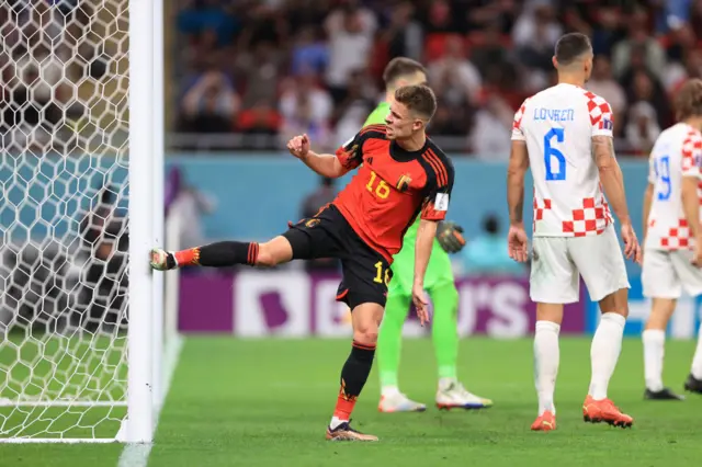 Belgium's Thorgan Hazard kicks the post