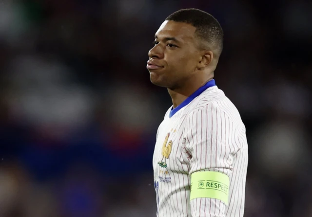 France's Kylian Mbappe reacts