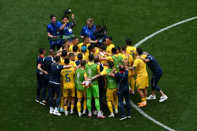 Romania players celebrate