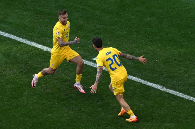 Denis Dragus celebrates his goal