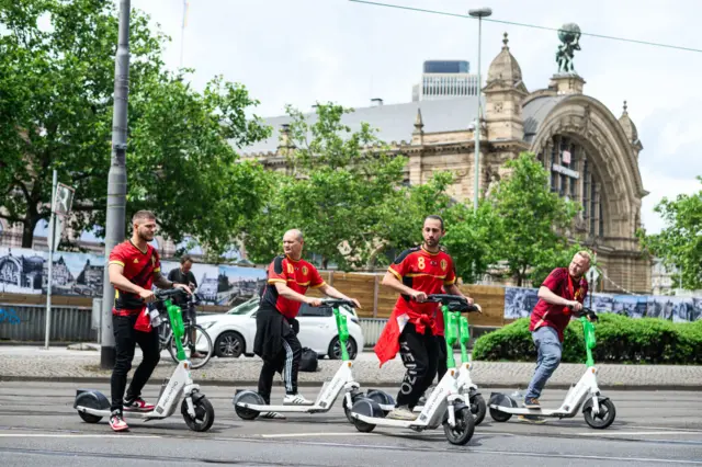 Belgium fans on scooters