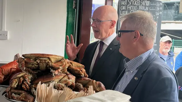 Swinney in a seafood shop