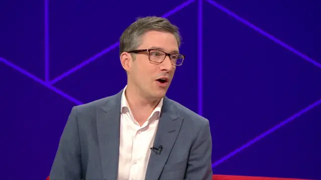 Adrian Ramsay sits in a chair and joins BBC host Nicky Campbell for an interview.