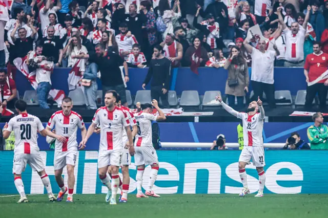 Georges Mikautadze (R) celebrates with teammates