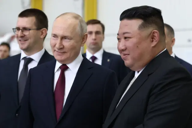 Russia's President Vladimir Putin (L) and North Korea's leader Kim Jong Un (R) visit the Vostochny Cosmodrome in Amur region on September 13