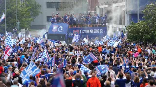 Ipswich Town players during an open-top bus parade in Ipswich to celebrate promotion to the Premier League.