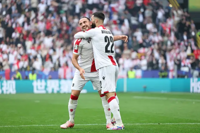 Georgian players celebrate their equaliser