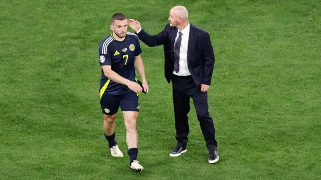 John McGinn of Scotland and Steve Clarke manager