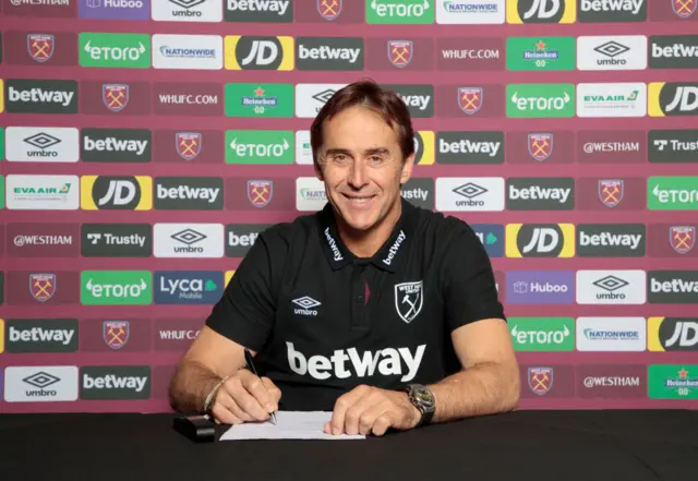 Julen Lopetegui smiles and signs West Ham United contract