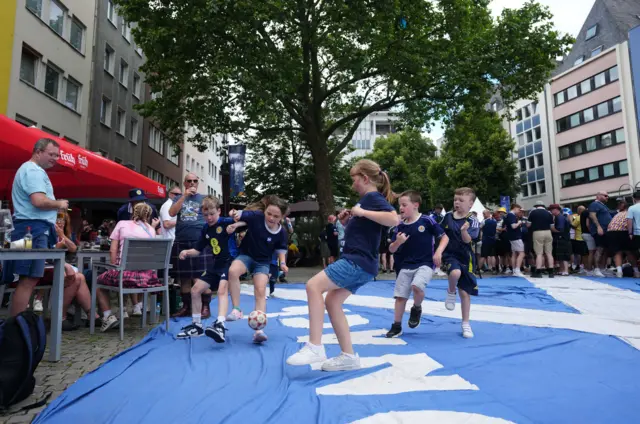 children playing at the old market