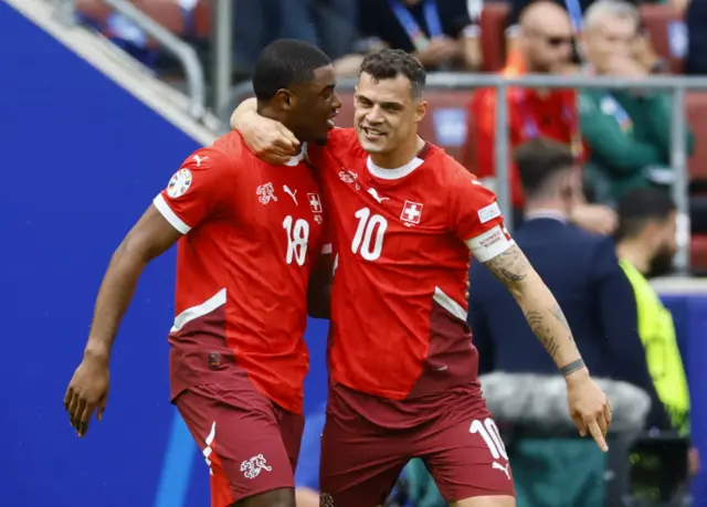 Kwadwo Duah celebrates scoring Switzerland's first goal against Hungary with Granit Xhaka