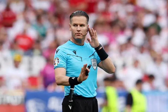 Referee Danny Makkelie gestures, before the goal scored by Mario Pasalic of Croatia (not pictured) is disallowed