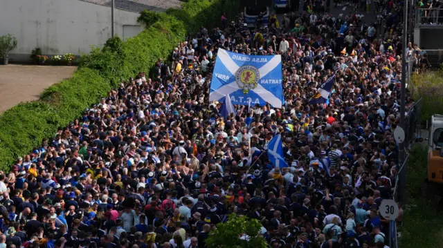 Scotland fans march