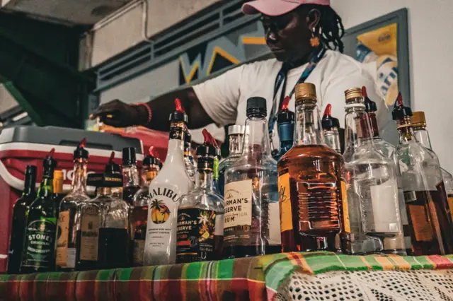 An array of alcoholic drinks bottles on a table