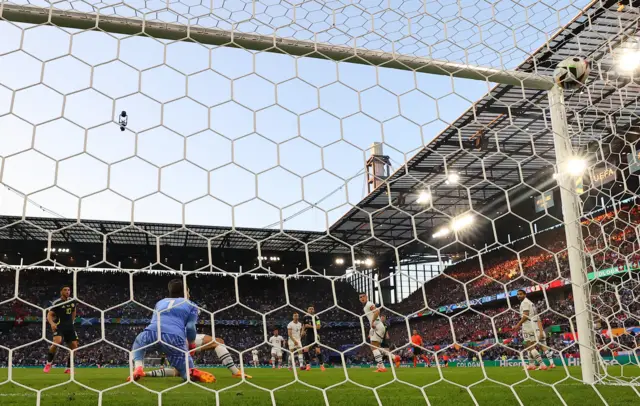 Scott McTominay's deflected shot for Scotland finds the net