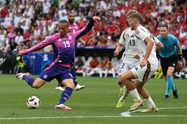 Leroy Sane takes a shot at goal