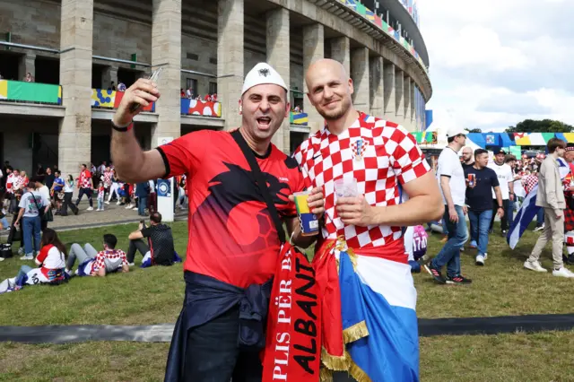 Croatia and Albania fans pose for a photo