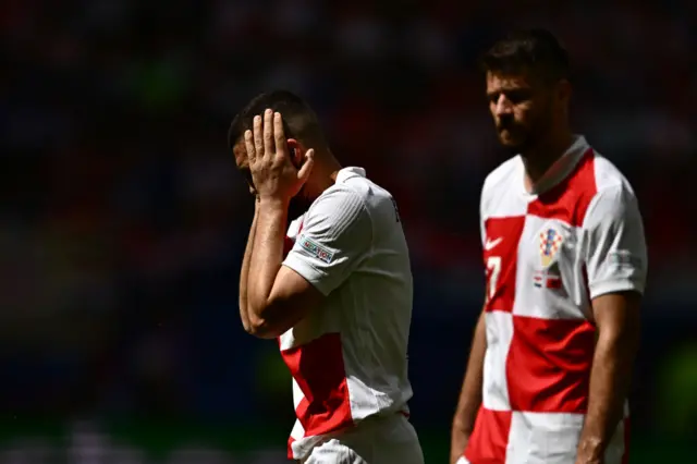 Croatia players show their frustration after another miss