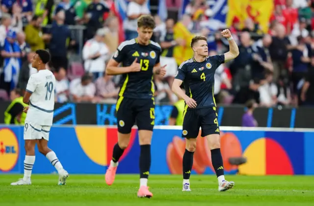 Scott McTominay celebrates after helping Scotland take the lead against Switzerland