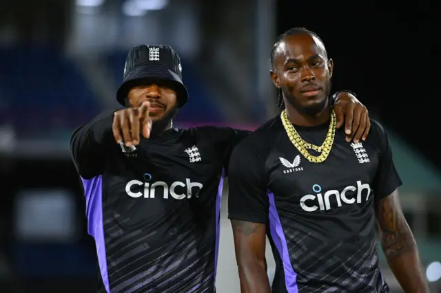 Chris Jordan puts his arm around Jofra Archer