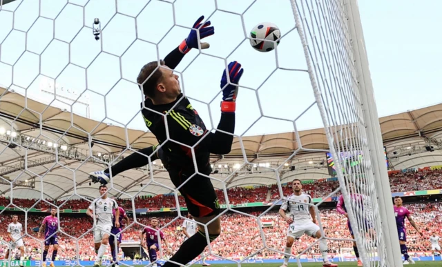 Hungary's Dominik Szoboszlai has his shot from a free kick saved by Germany's Manuel Neuer