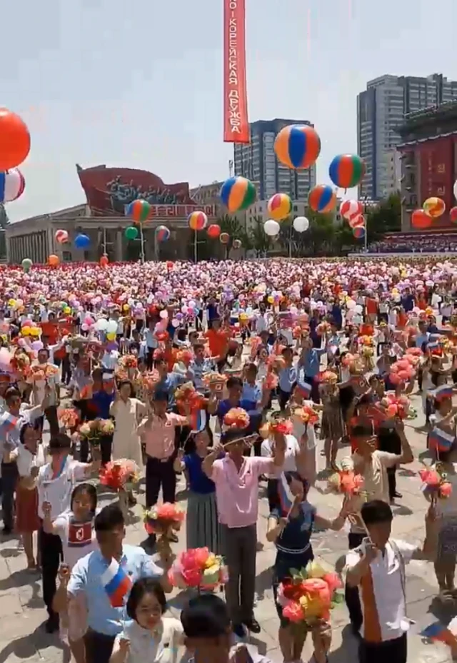 Locals assembled in the square outside