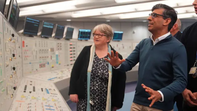 Rishi Sunak looks startled visiting a training control room at a nuclear power