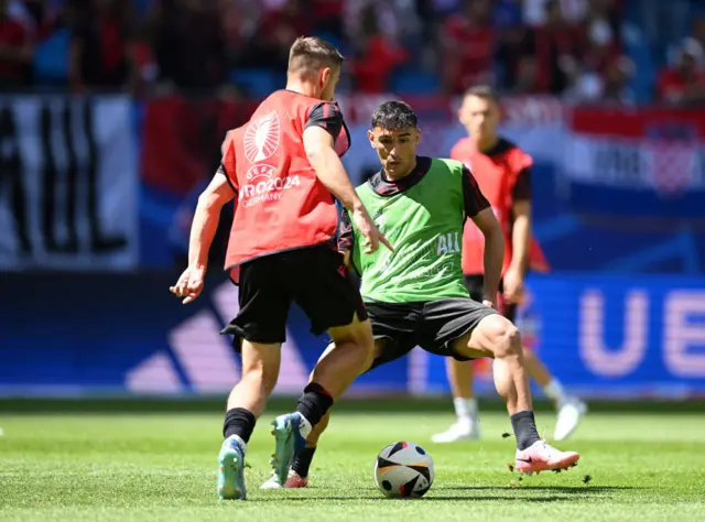 Albania's Laci warms up in a passing drill