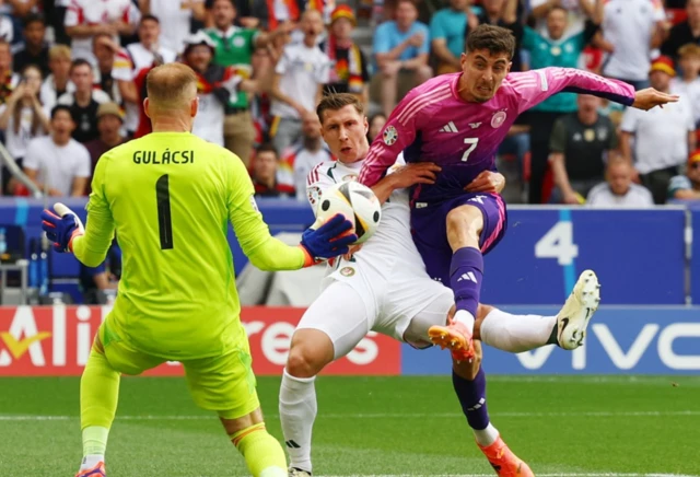 Hungary's Peter Gulacsi in action as he makes a save from Germany's Kai Havertz