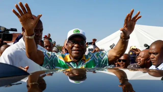 Former South African President Jacob Zuma gestures after voting during the South African elections, in Nkandla, South Africa May 29, 2024