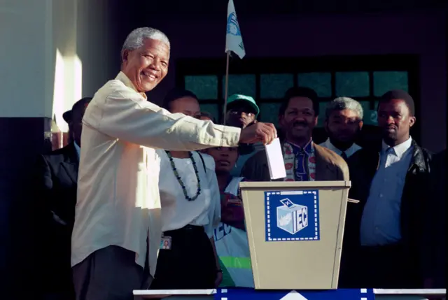 President Nelson Mandela votes at a small station on April 28, 1994 outside Durban, Natal during the historic democratic election February 28, 1994 in South Africa.