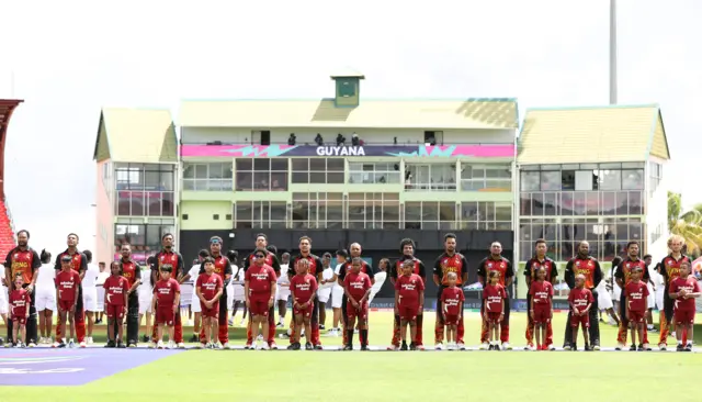 Papua New Guinea line up for the national anthem against West Indies