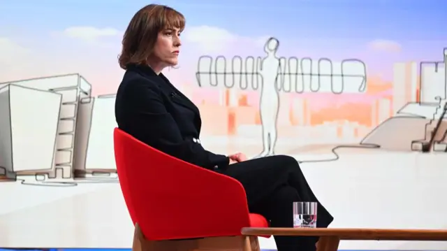 Victoria Atkins sits in a red chair in the Kuenssberg show studio