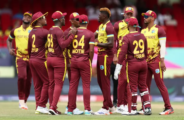 West Indies' Alzarri Joseph celebrates taking the wicket of PNG's Asad Vala