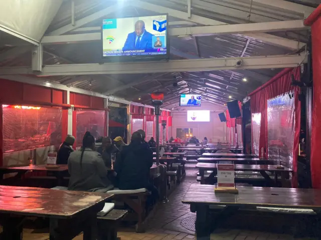 Patrons in a bar in Joburg