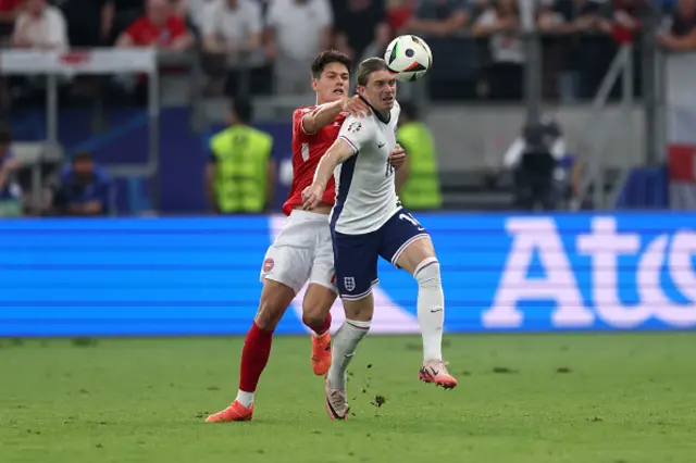 : Conor Gallagher of England and Joakim Maehle of Denmark battle for possession