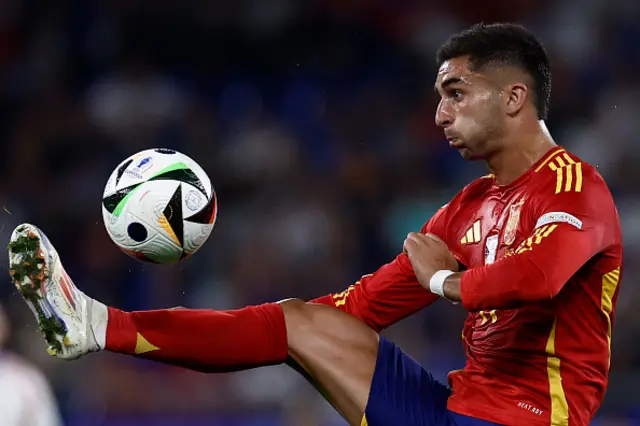 Ferran Torres kicks the ball