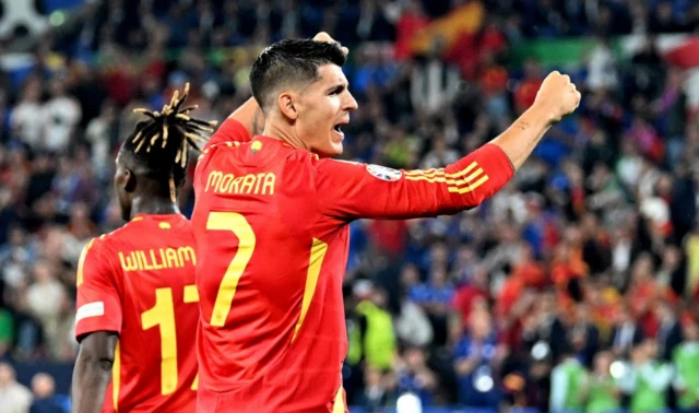 Spain's Alvaro Morata celebrates their first goal