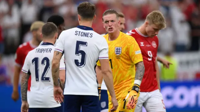 England players looking frustrated during a Euro 2024 game against Denmark