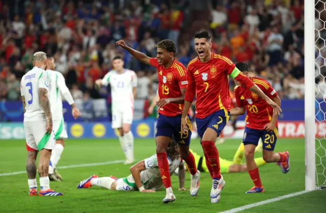 Lamine Yamal and Alvaro Morata celebrate for Spain