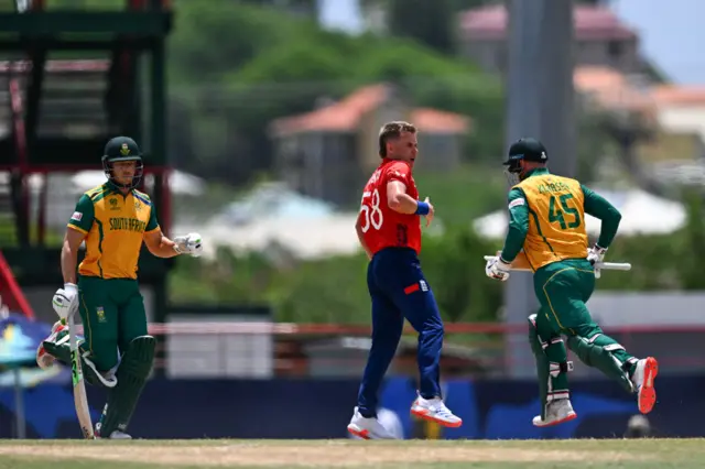 Sam Curran looks on