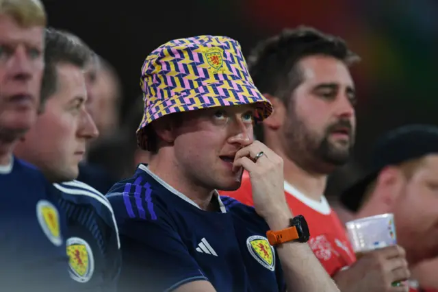 A Scotland fan chews his nails