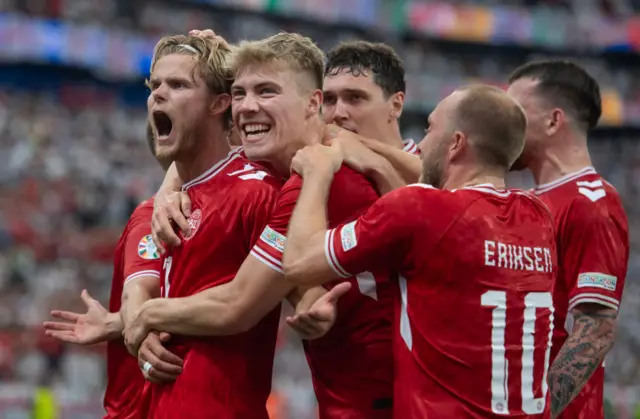 Morten Hjulmand celebrates scoring the equaliser with his Denmark team-mates